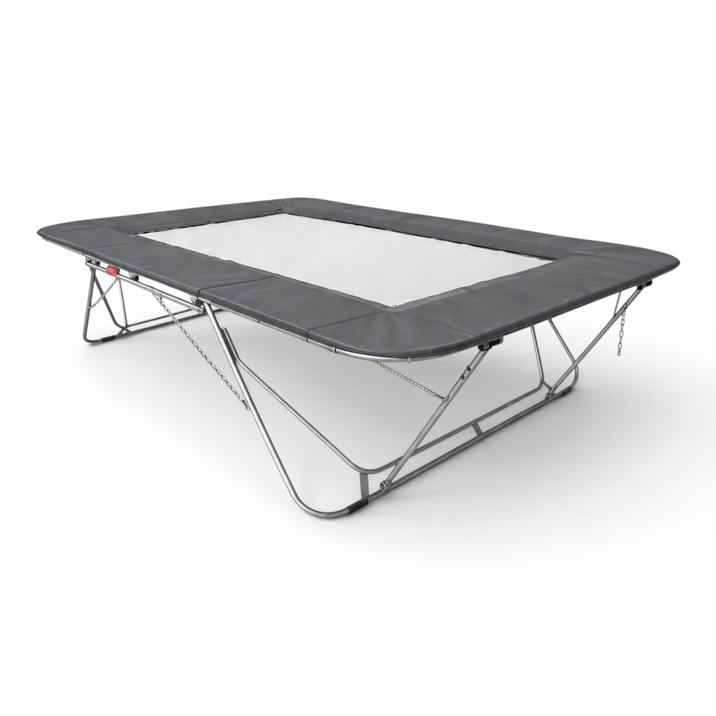 UK Gym Pits 77a standard trampoline with a white super-mesh bed and grey protective frame pads on a metal frame