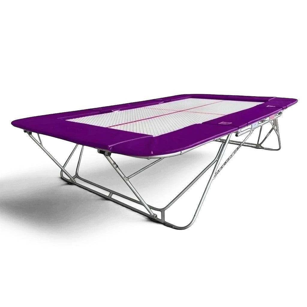 UK Gym Pits 77a standard trampoline with a white super-mesh bed and purple protective frame pads on a black background