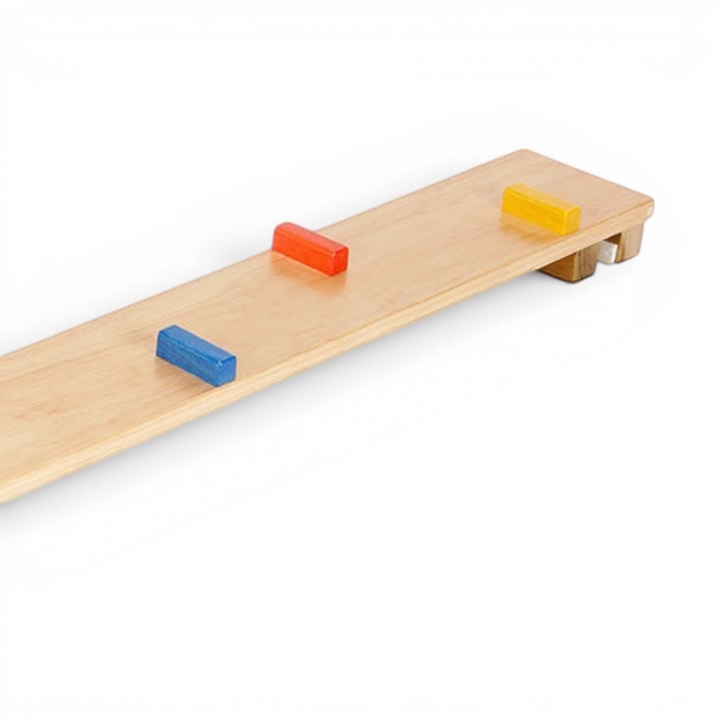 UK Gym Pits Activ Block Plank made of natural timber with multicoloured blocks and anti-slip rubber pads for stability.