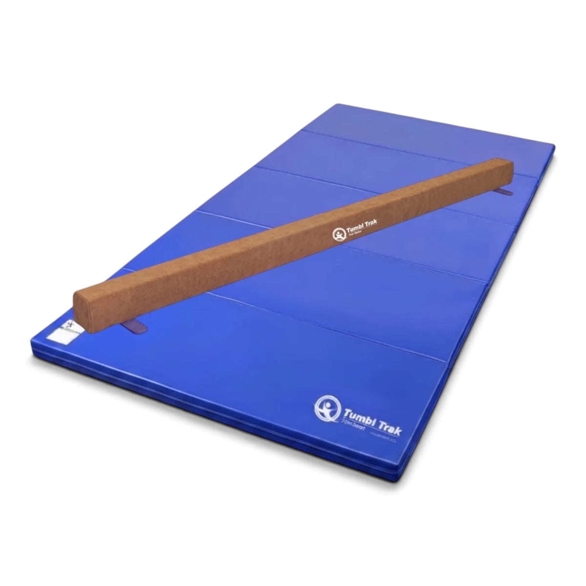 UK Gym Pits Addie beam in tan synthetic suede placed on a blue folding tumbling mat for home gymnastics training.