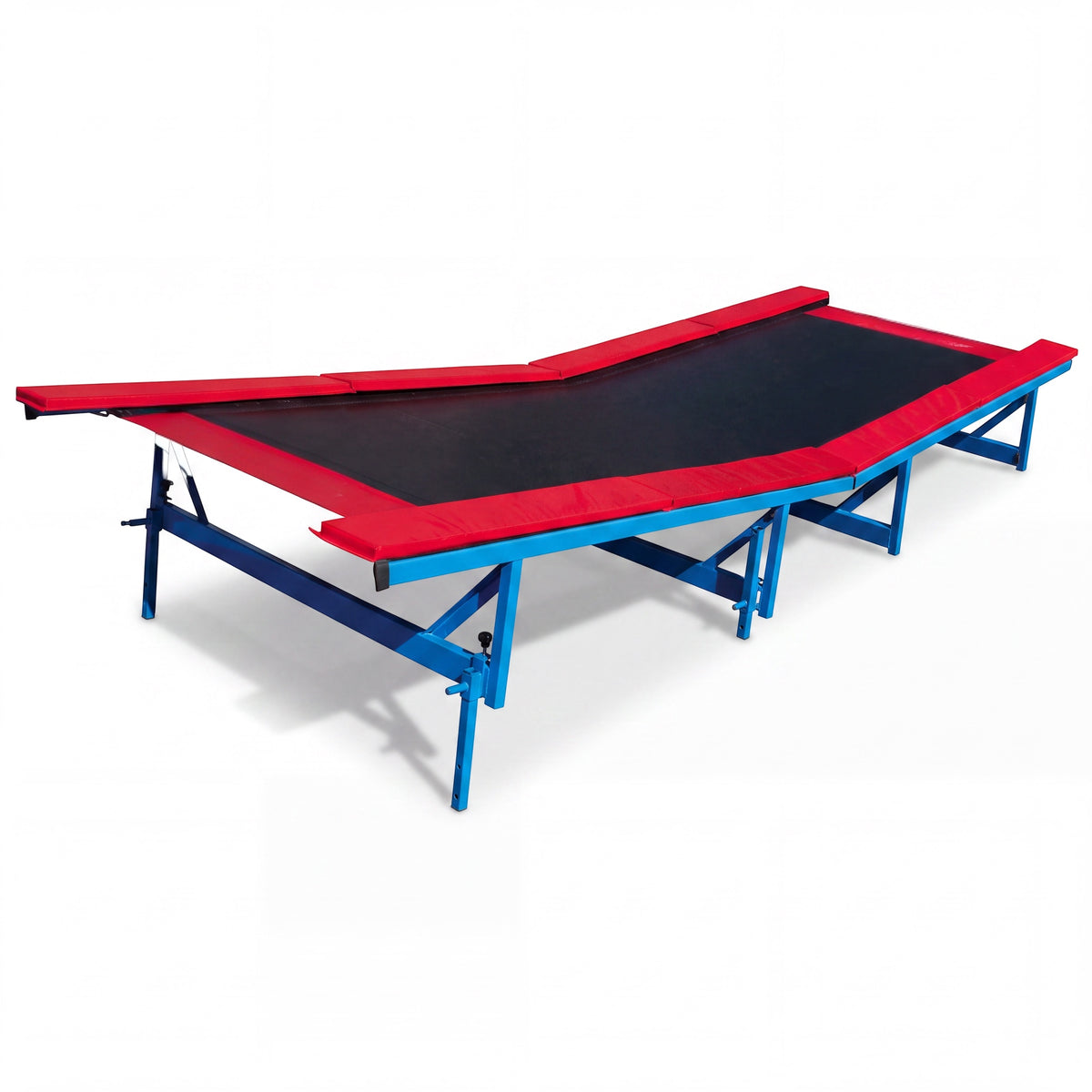 UK Gym Pits adjustable downhill incline attachment mounted on a Tumbl Trak with red padding and a blue metal frame.