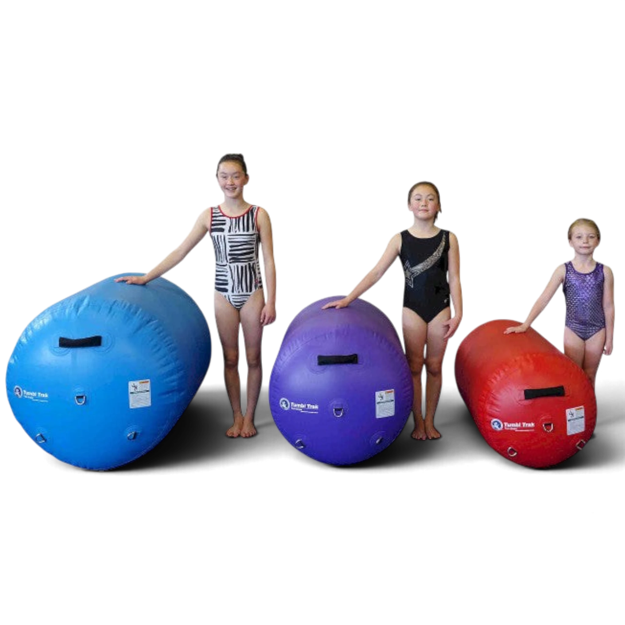 UK Gym Pits air barrels in blue, purple, and red with young gymnasts for size comparison and training drills.
