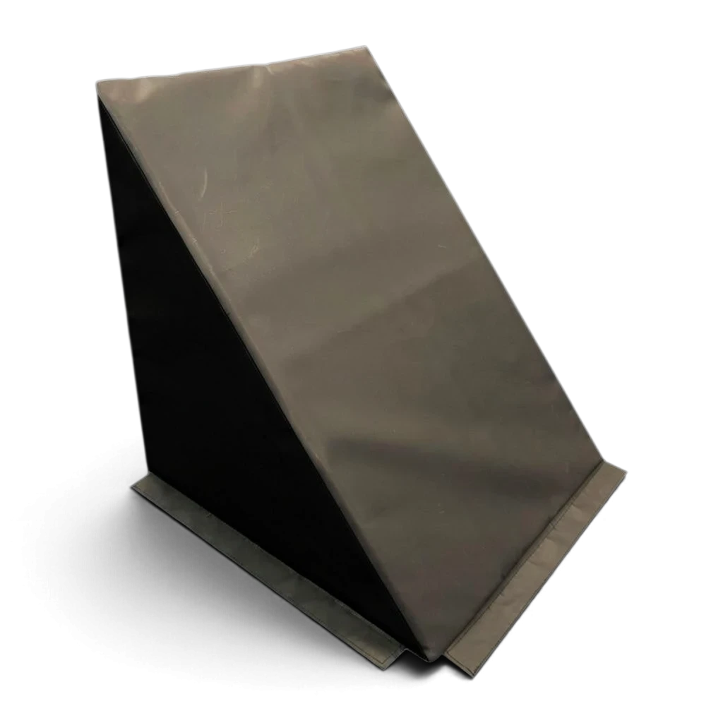 UK Gym Pits black wedge-shaped foam ninja step for parkour and gymnastics training with non-slip base.