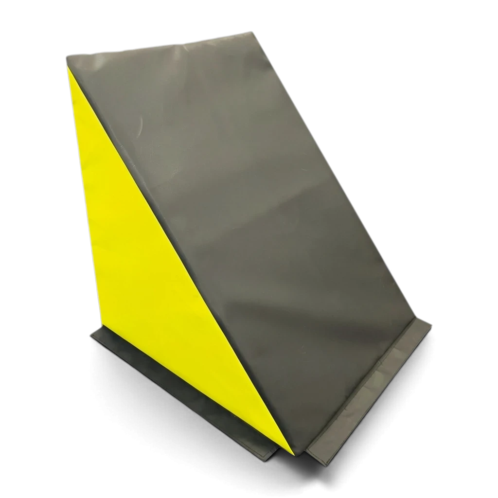 UK Gym Pits black and yellow wedge-shaped foam ninja step for parkour and obstacle course training.