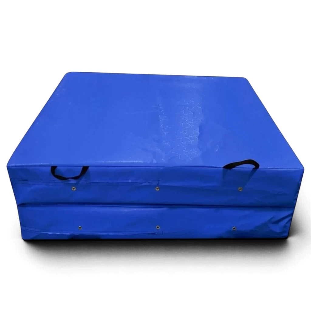 UK Gym Pits blue folding safety mat with heavy duty handles and breather holes for gymnastics and martial arts