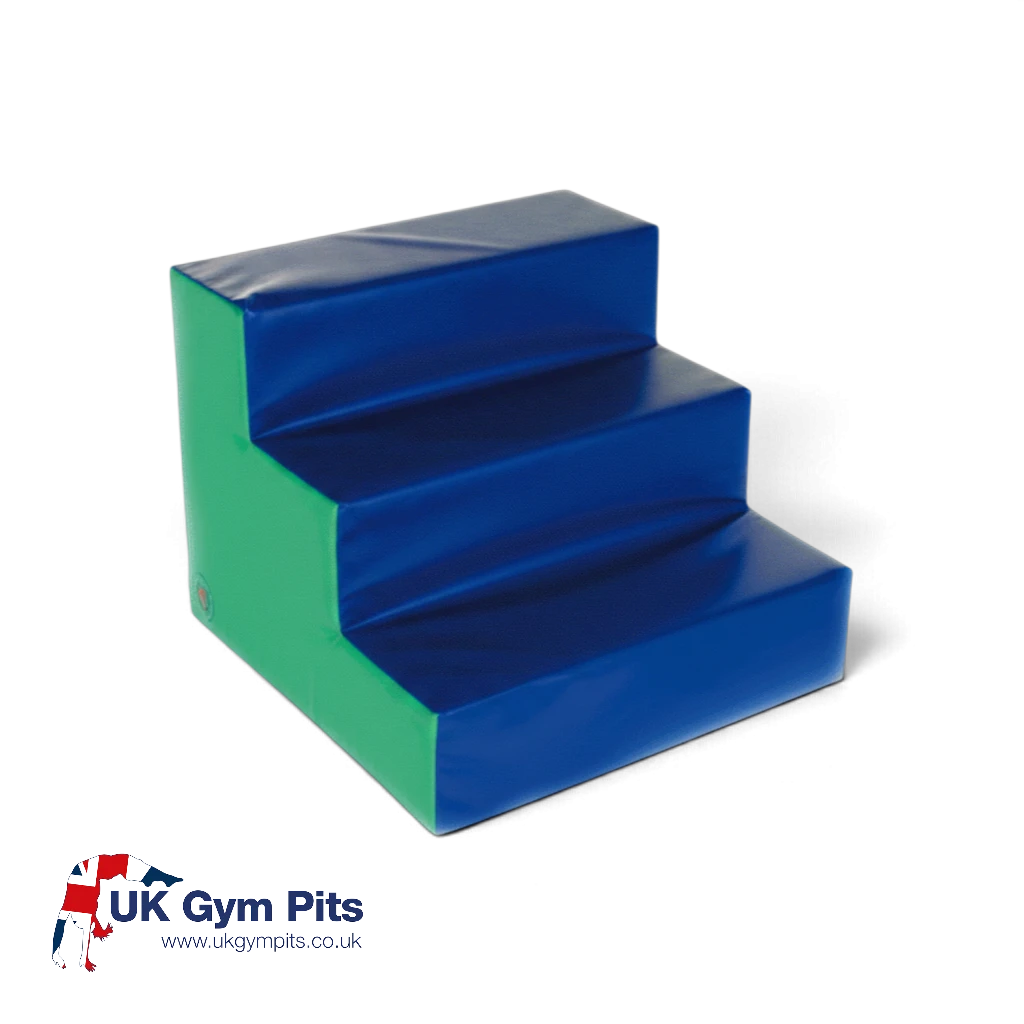 UK Gym Pits soft play fun steps with blue steps and green sides for children's gross motor skill development.