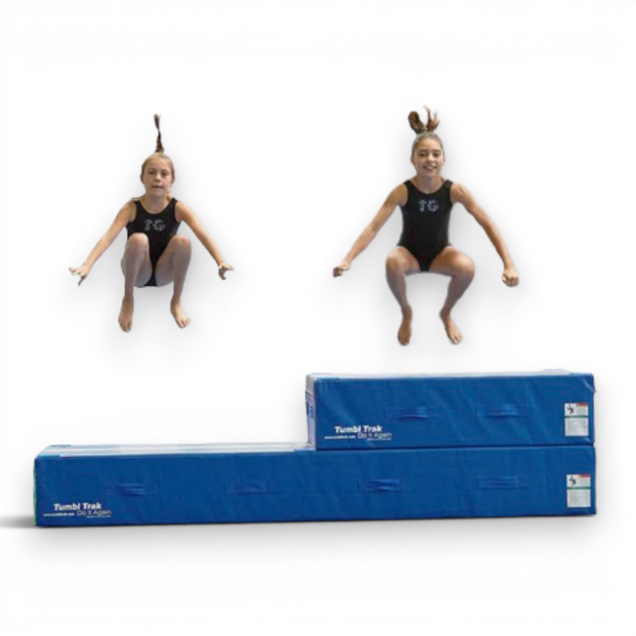 Two gymnasts jumping over UK Gym Pits blue foam spotting blocks with white guide lines for training bar skills.