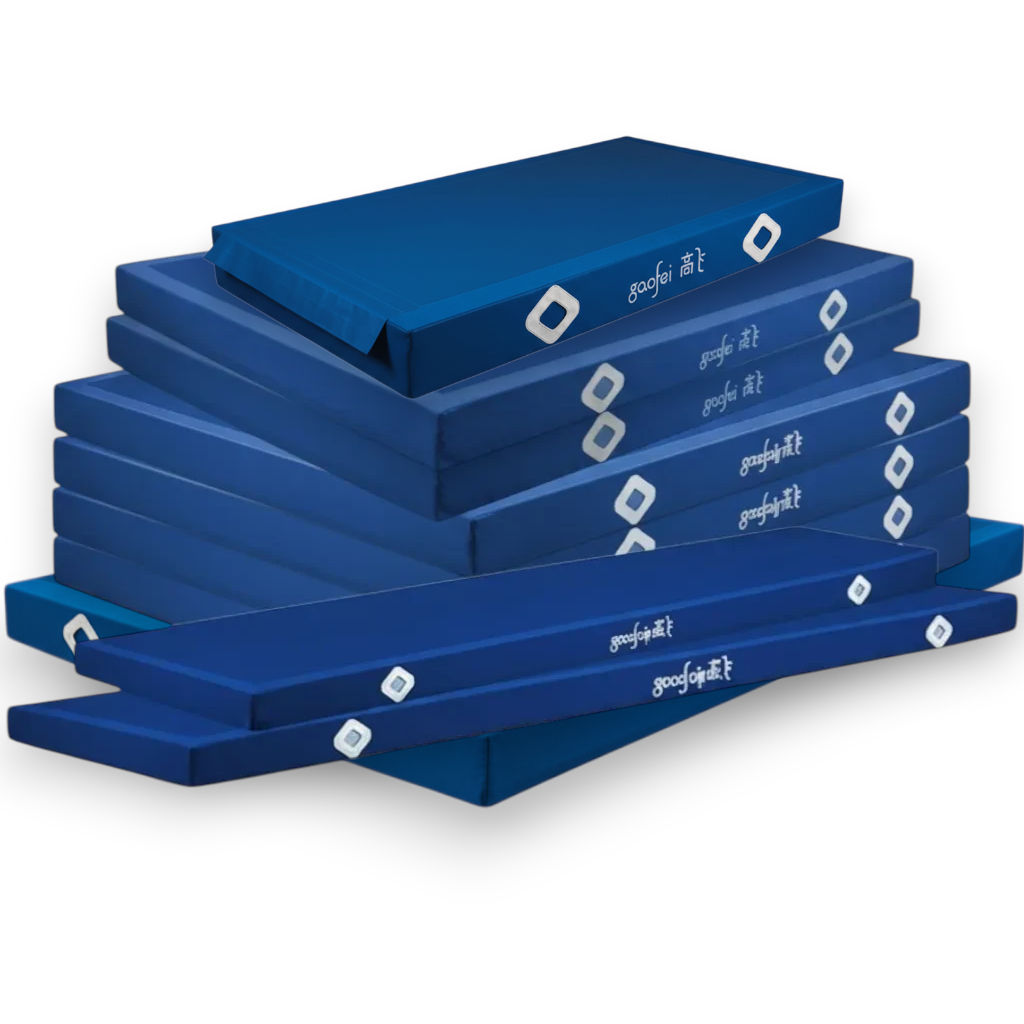 UK Gym Pits FIG approved blue parallel bars landing mats stacked for training and competition use.