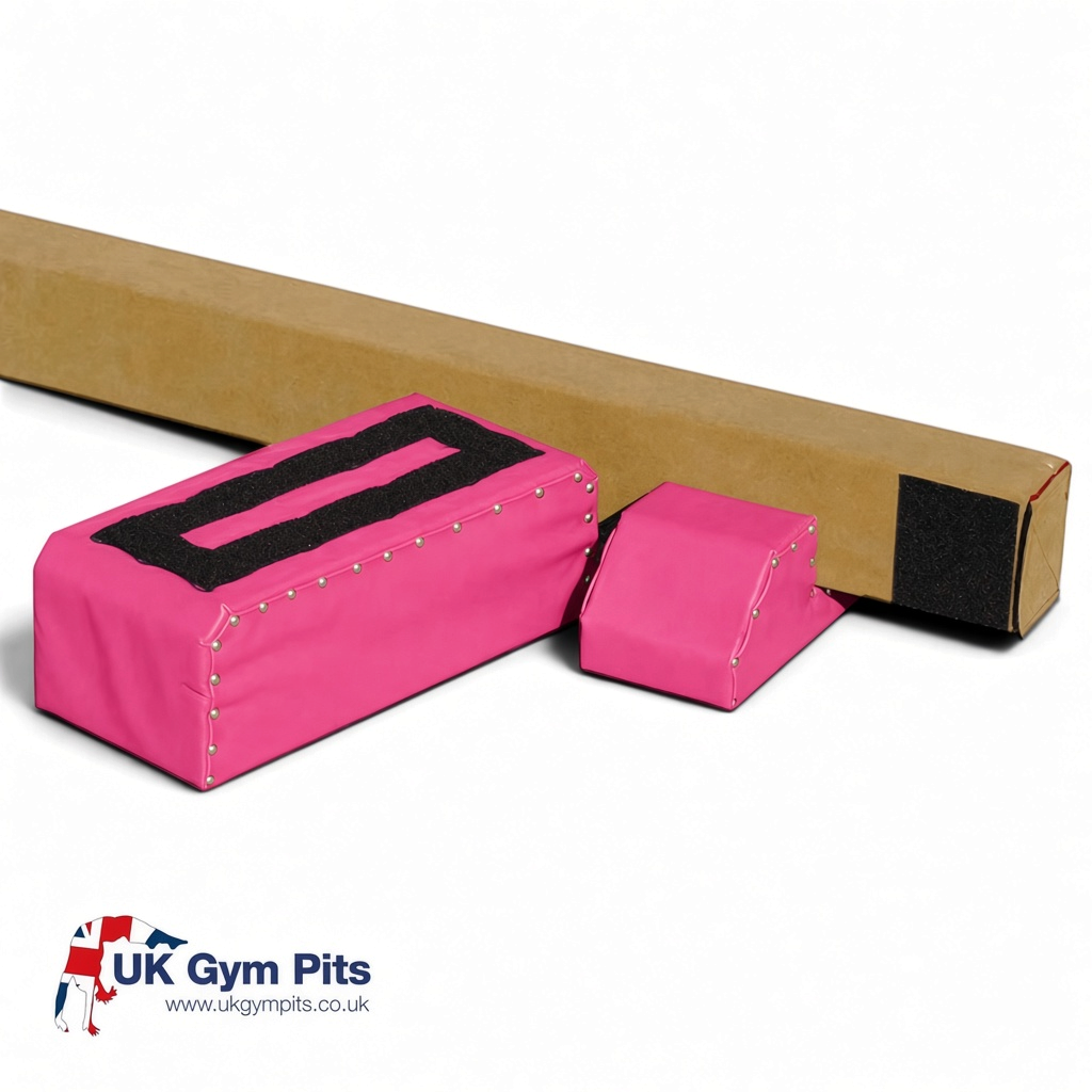 UK Gym Pits pink Brianna beam riser legs for gymnastics training, featuring Velcro attachments for easy assembly.