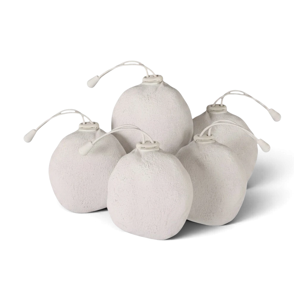 UK Gym Pits chalk balls in a white cotton drawstring sack for improved grip in gymnastics and rock climbing