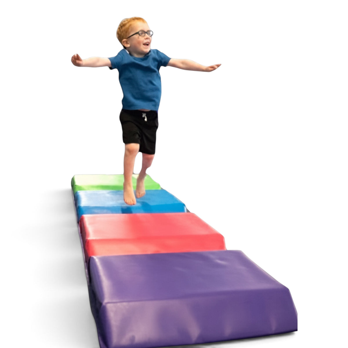 UK Gym Pits colour tunnel mat with a young boy jumping across the foam panels in a play obstacle course