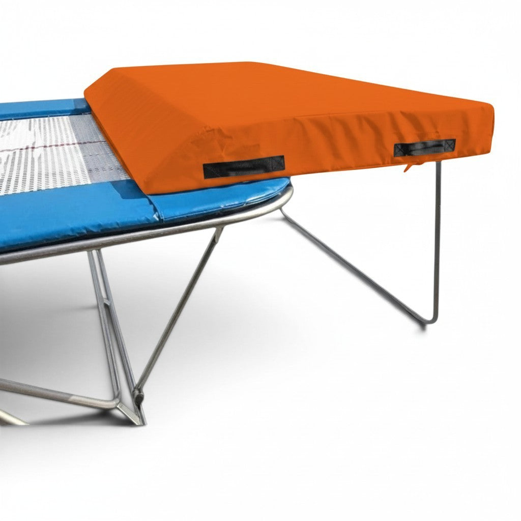 UK Gym Pits economy spotting end deck with orange wedge mat attached to a trampoline frame