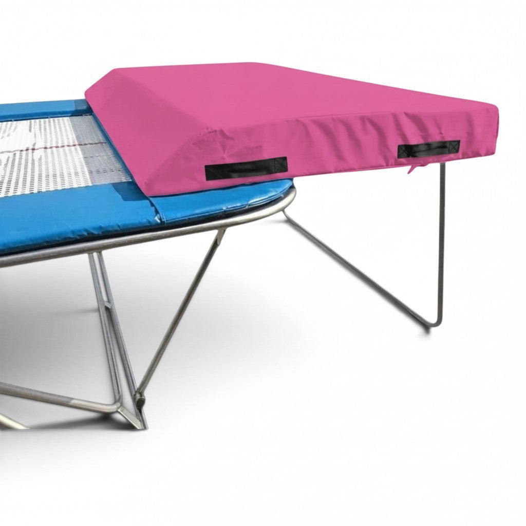 UK Gym Pits economy spotting end deck with a pink wedge safety mat attached to a silver trampoline frame