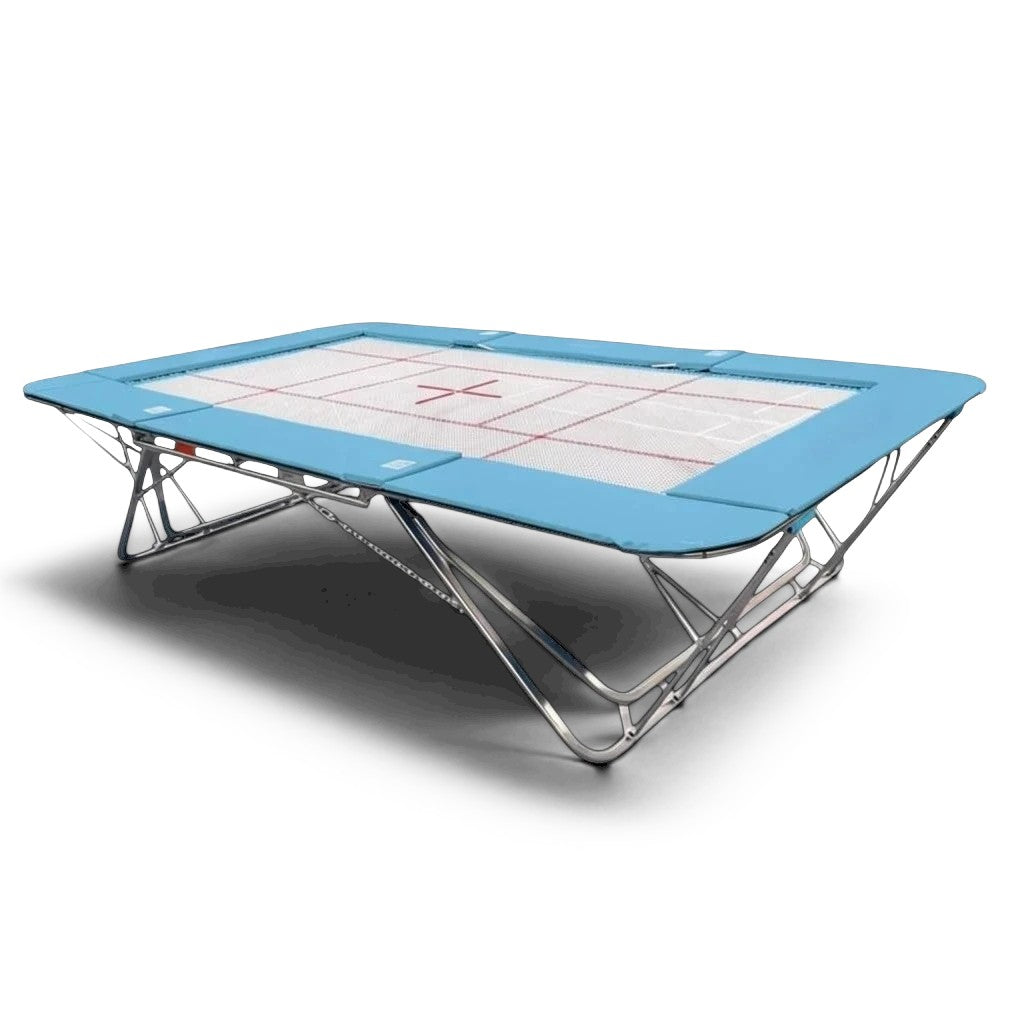 UK Gym Pits GM Extreme competition trampoline with a 4mm by 6mm web bed and light blue protective frame pads.