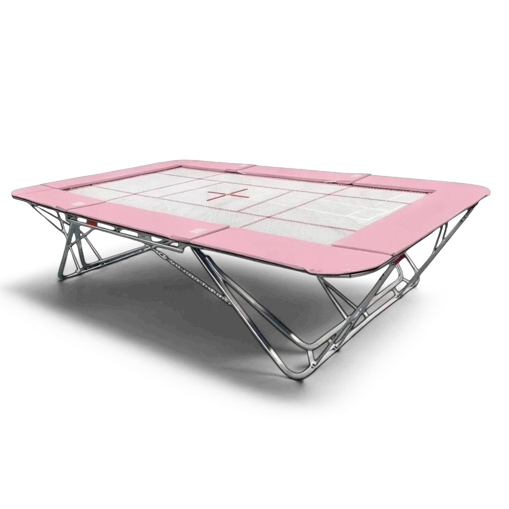 UK Gym Pits GM Extreme competition trampoline with a pink frame pad and a 4mm by 6mm web bed with FIG markings.