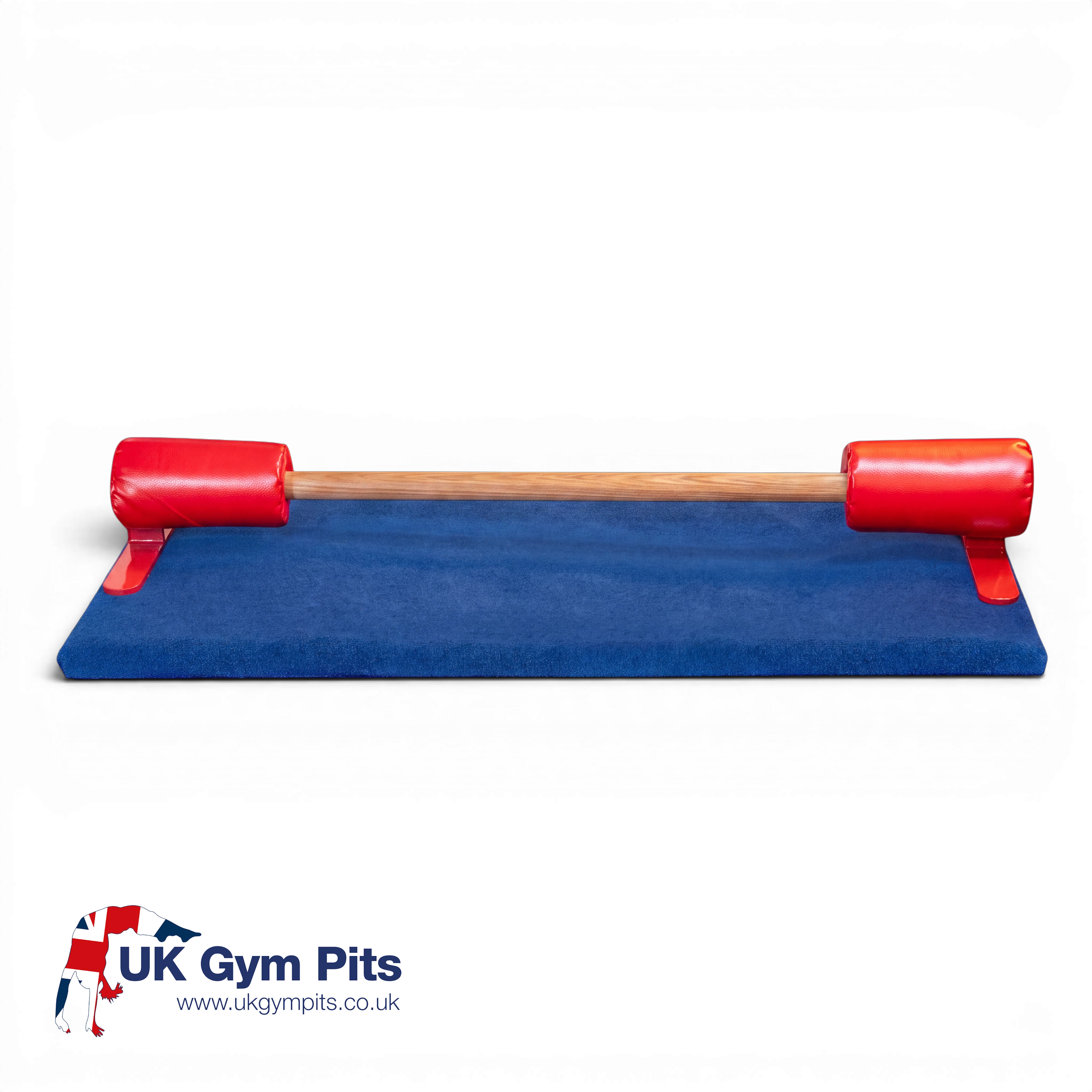 UK Gym Pits floor bar with wooden training rail and red foam pads on a royal blue carpeted build a mat base