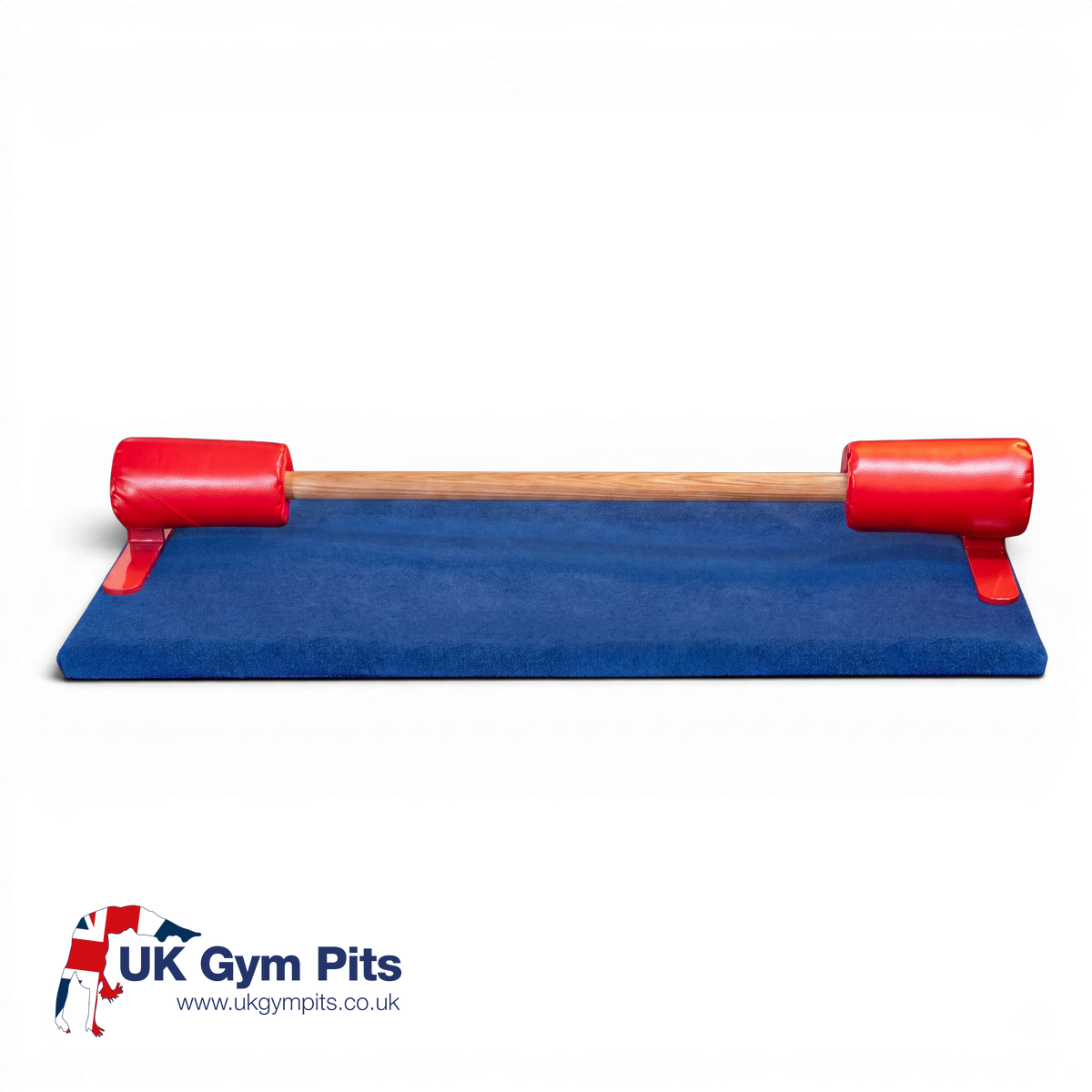 UK Gym Pits floor bar with wooden training rail and red foam pads on a royal blue carpeted build a mat base