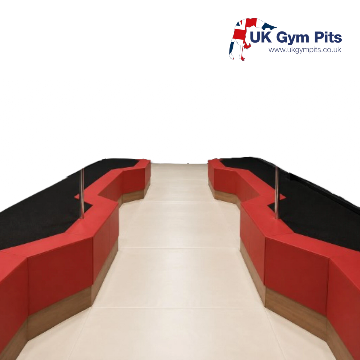 UK Gym Pits foam landing pit base with red padded edges and a smooth beige floor surface for gymnastics facilities