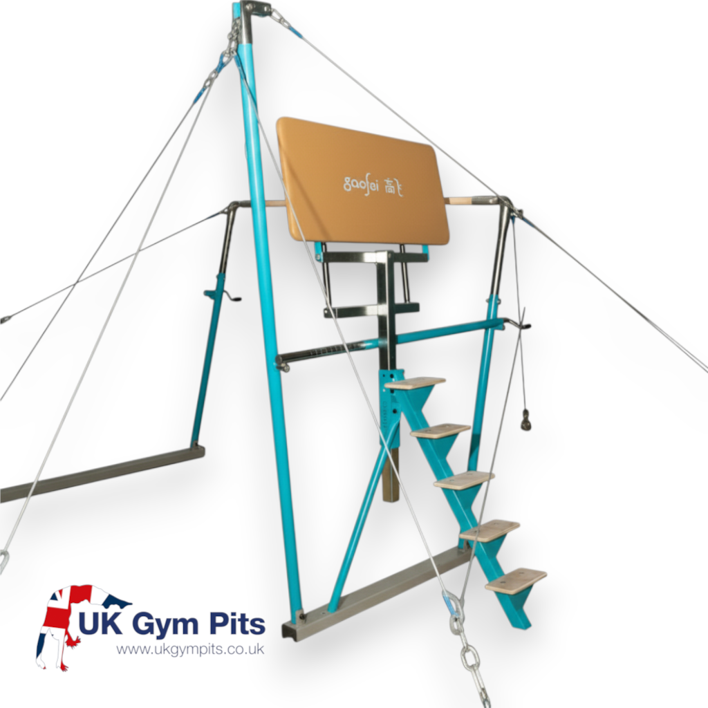 UK Gym Pits Gaofei asymmetric bars spotting platform with a blue steel frame, ladder, and tan padded surface.