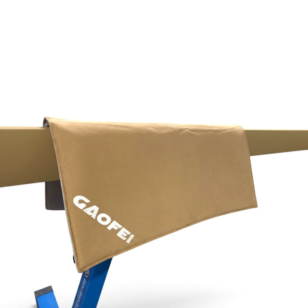 UK Gym Pits Gaofei tan PU gymnastics beam mat with anti-slip surface draped over a training beam