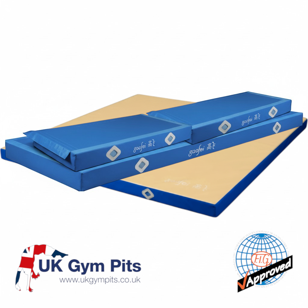 UK Gym Pits Gaofei FIG approved blue and beige ring frame gymnastics landing mats with non-slip base and Velcro locks.