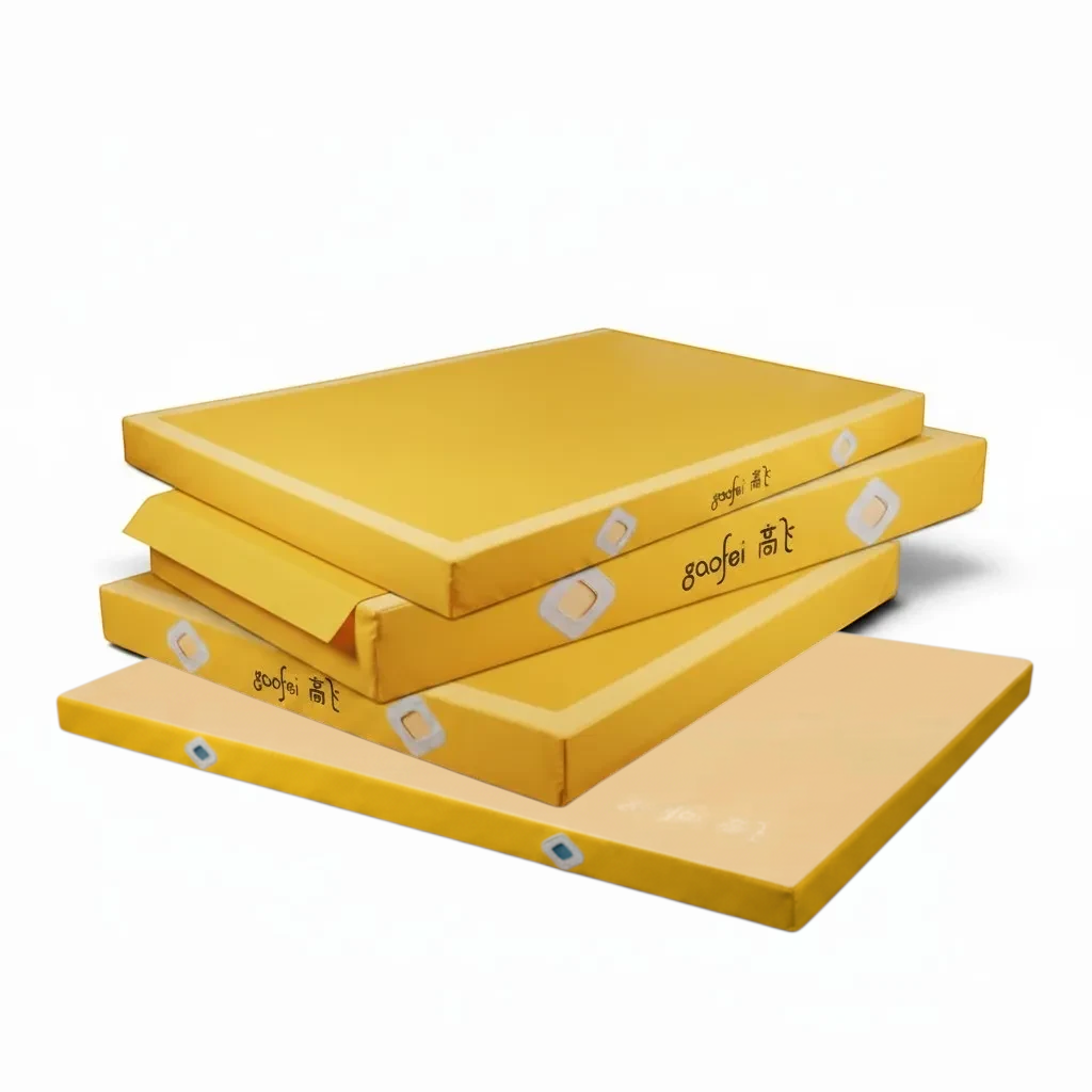 UK Gym Pits Gaofei yellow gymnastics landing mats with air distribution mesh windows and durable PVC vinyl covers.