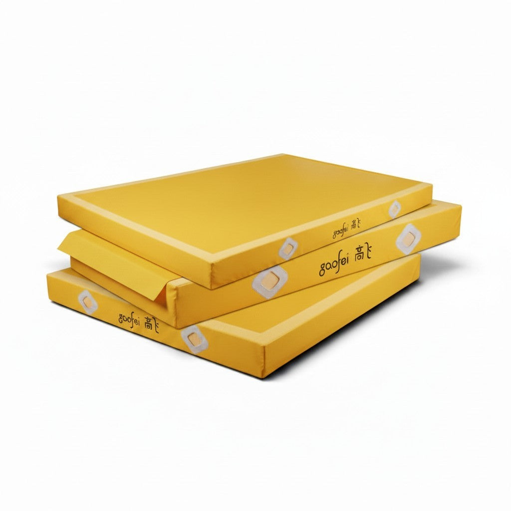 UK Gym Pits yellow Gaofei gymnastics landing mats with durable PVC vinyl covers and reinforced corners for safe training.