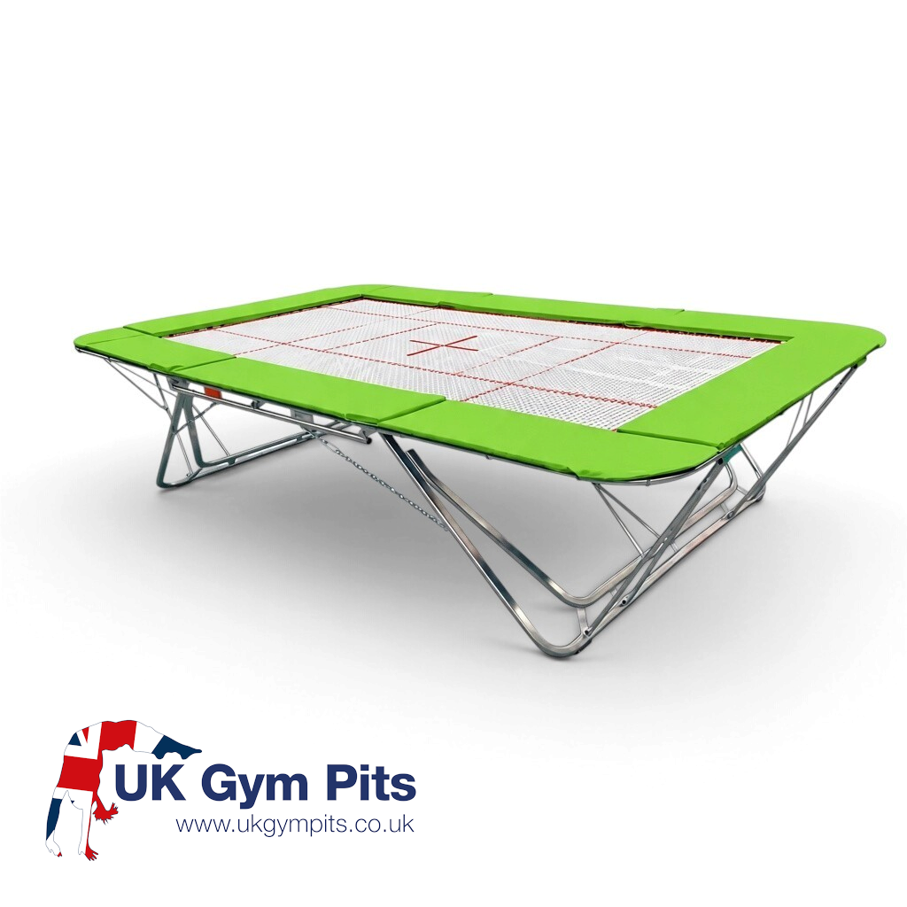 UK Gym Pits GM Extreme competition trampoline with a 13mm web bed, green frame pads, and steel spring frame.