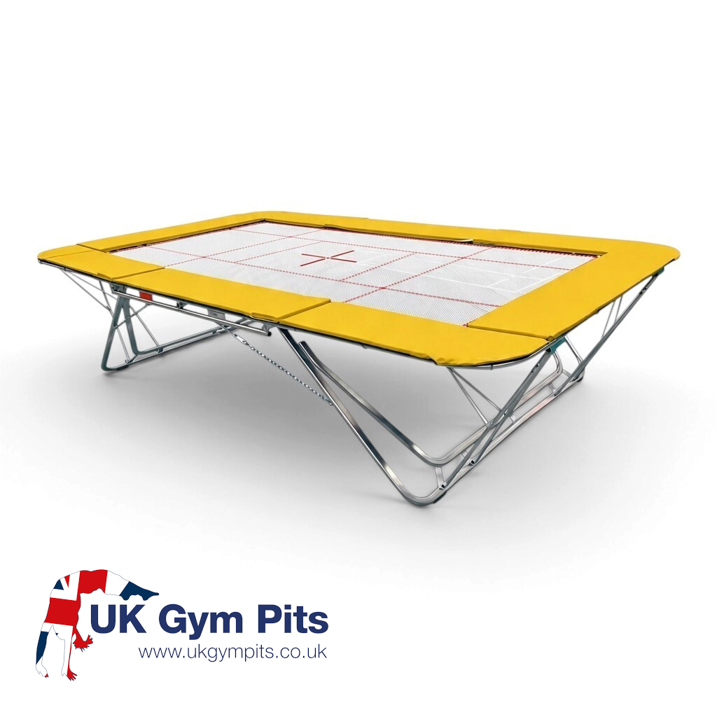 UK Gym Pits GMEX Extreme competition trampoline with yellow frame pads and a white web bed on a white background