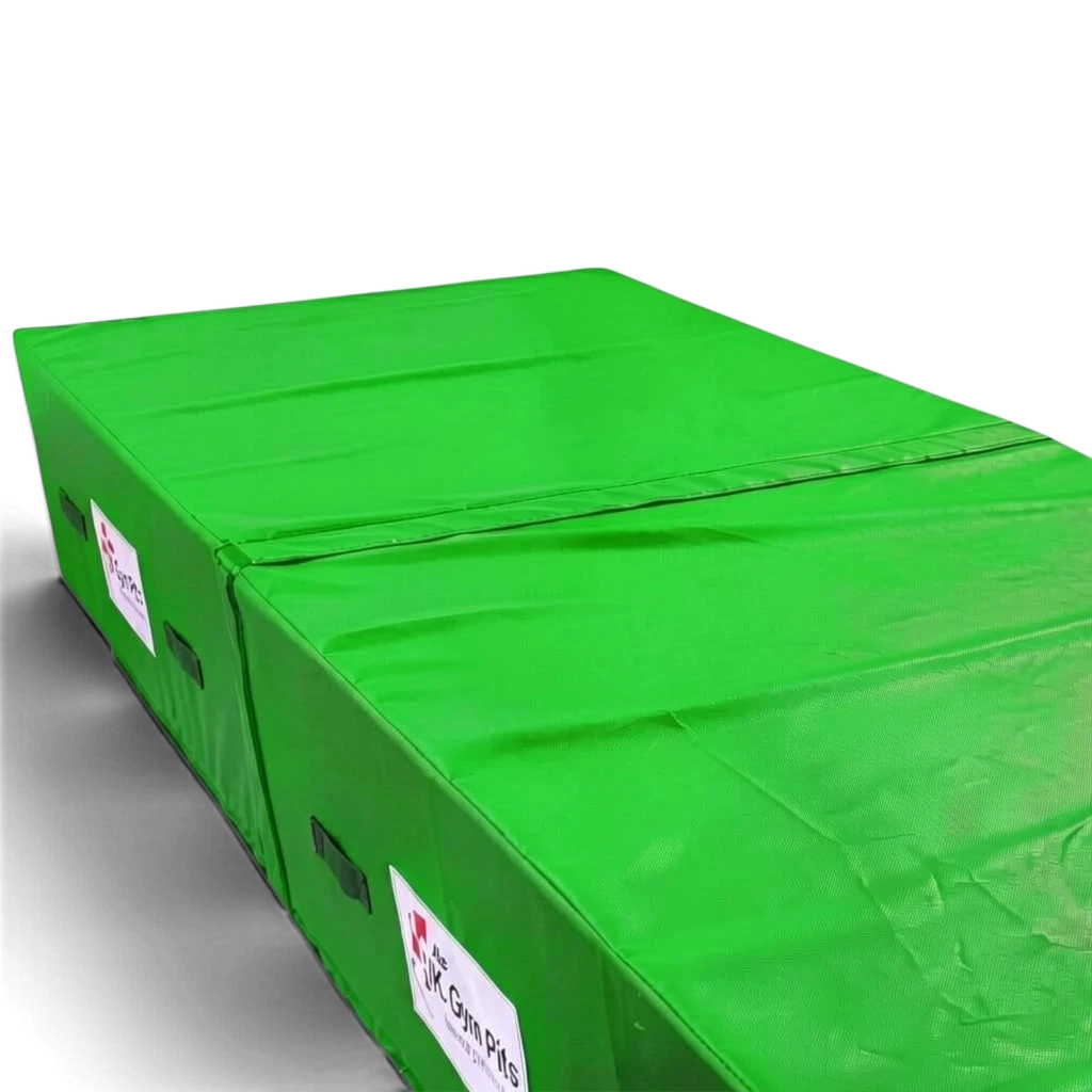 UK Gym Pits green heavy-duty foam track run-up block with anti-slip base and transport handles for gymnastics