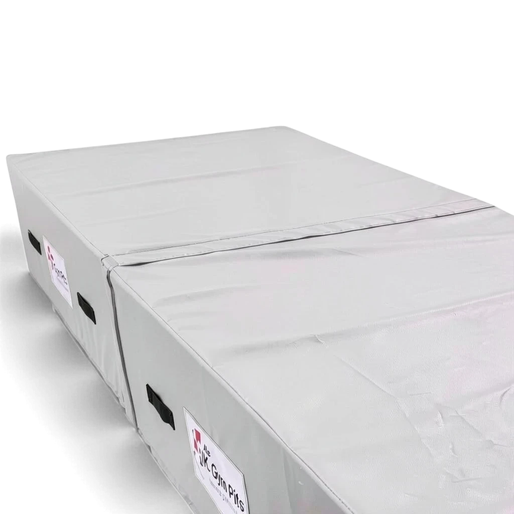UK Gym Pits grey heavy-duty foam track run-up block with anti-slip base and transport handles for gymnastics training
