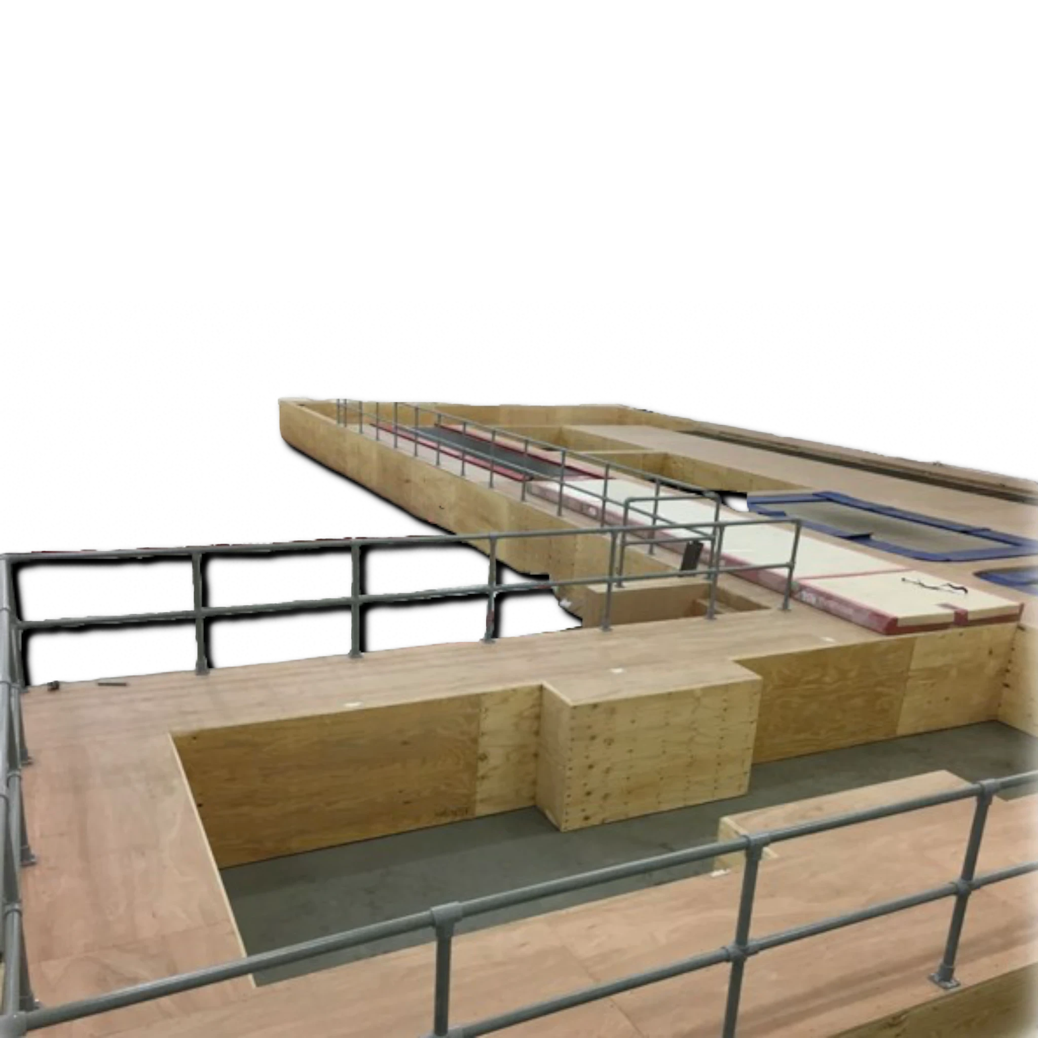 UK Gym Pits GRP handrail system installed on a wooden raised pit podium for safety in a gymnasium environment