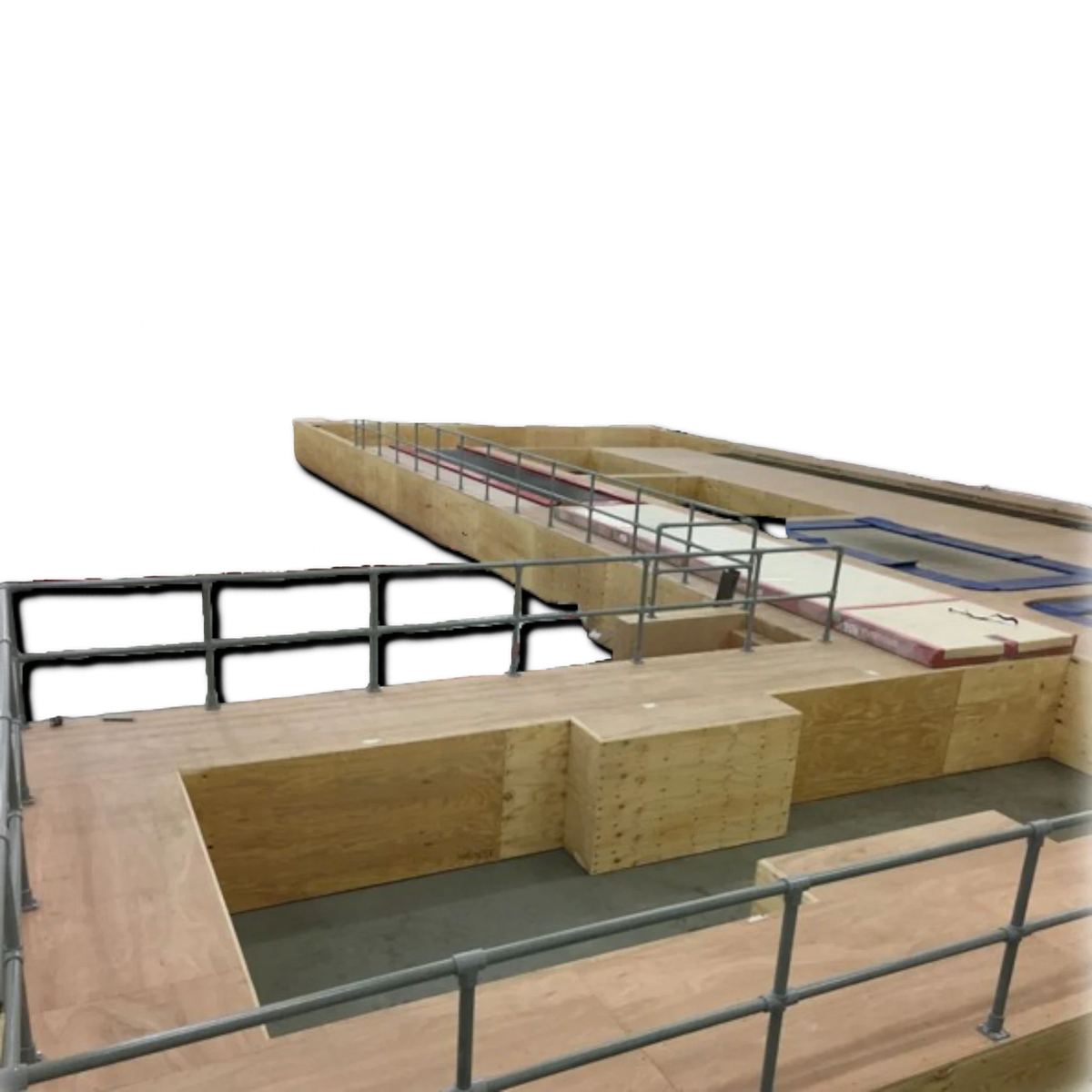 UK Gym Pits 6m GRP tubing used as a top rail for a safety handrail system on a wooden gym podium