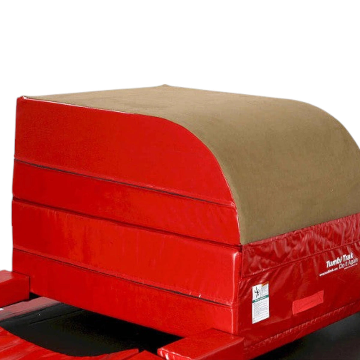 UK Gym Pits gymnastics vault block with red vinyl base, tan suede topper, and foam padding for vaulting training.