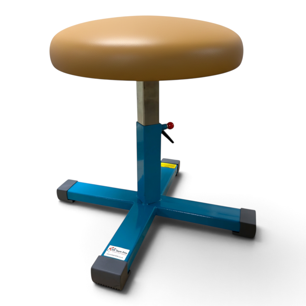 UK Gym Pits height adjustable gymnastics training mushroom with a tan PU leatherette top and blue steel base.