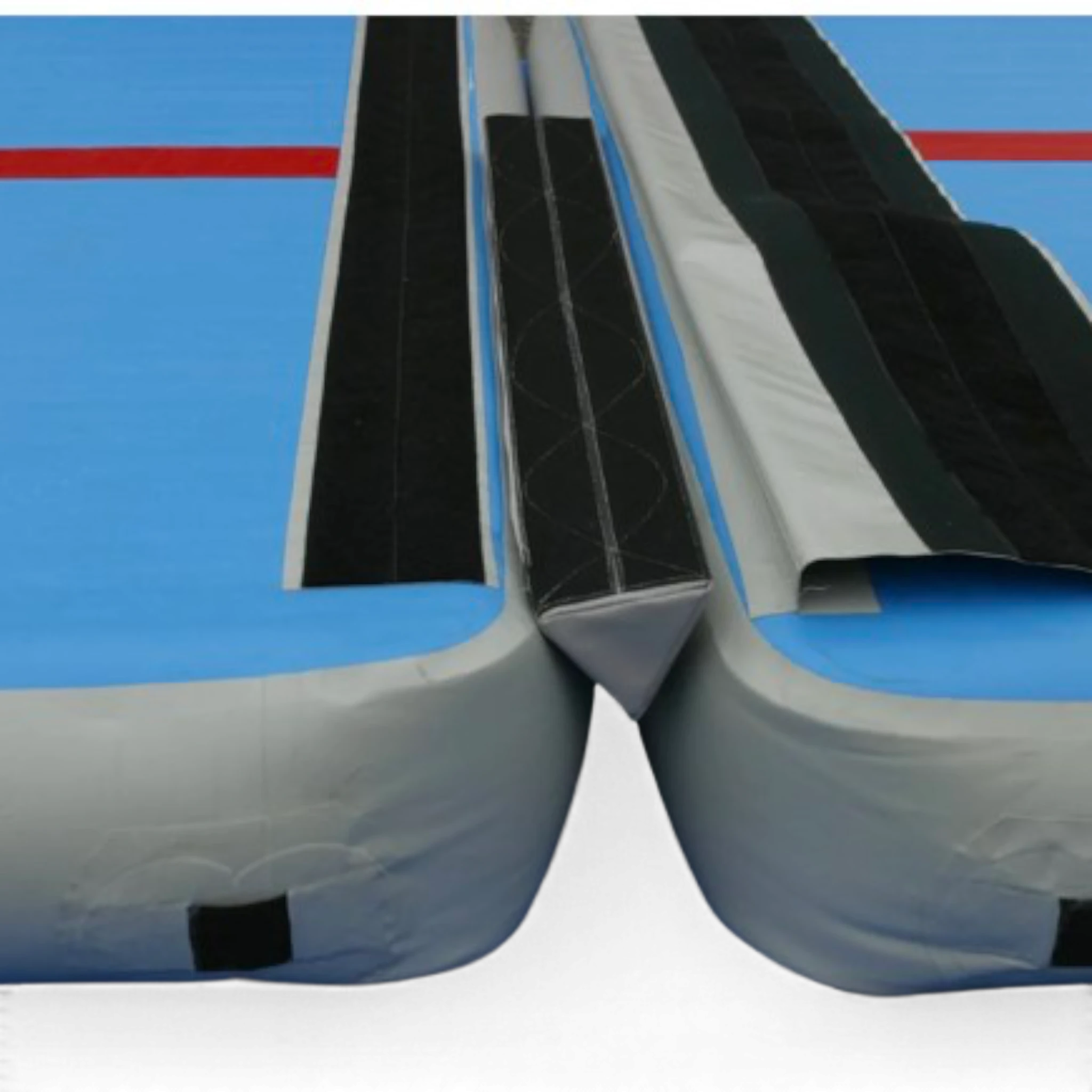 UK Gym Pits Air Floor Pro showing blue inflatable tumbling mats connected with black Velcro extension flaps