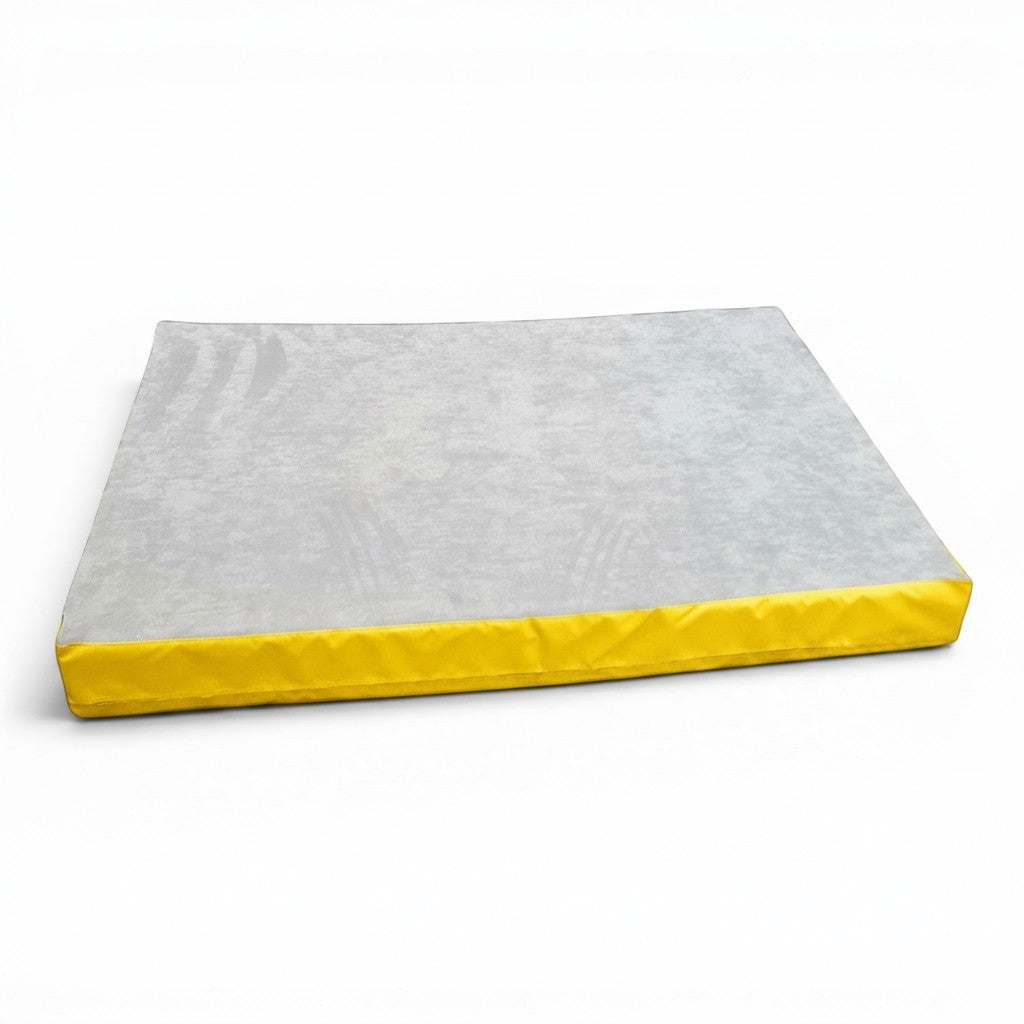 UK Gym Pits jersey topped crash mat with a soft grey fabric surface and yellow PVC sides for gymnastics training.