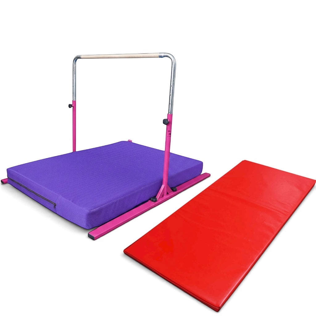 UK Gym Pits Junior Bar Pro gymnastics set with pink frame, purple practice mat, and red build-a-mat panel.