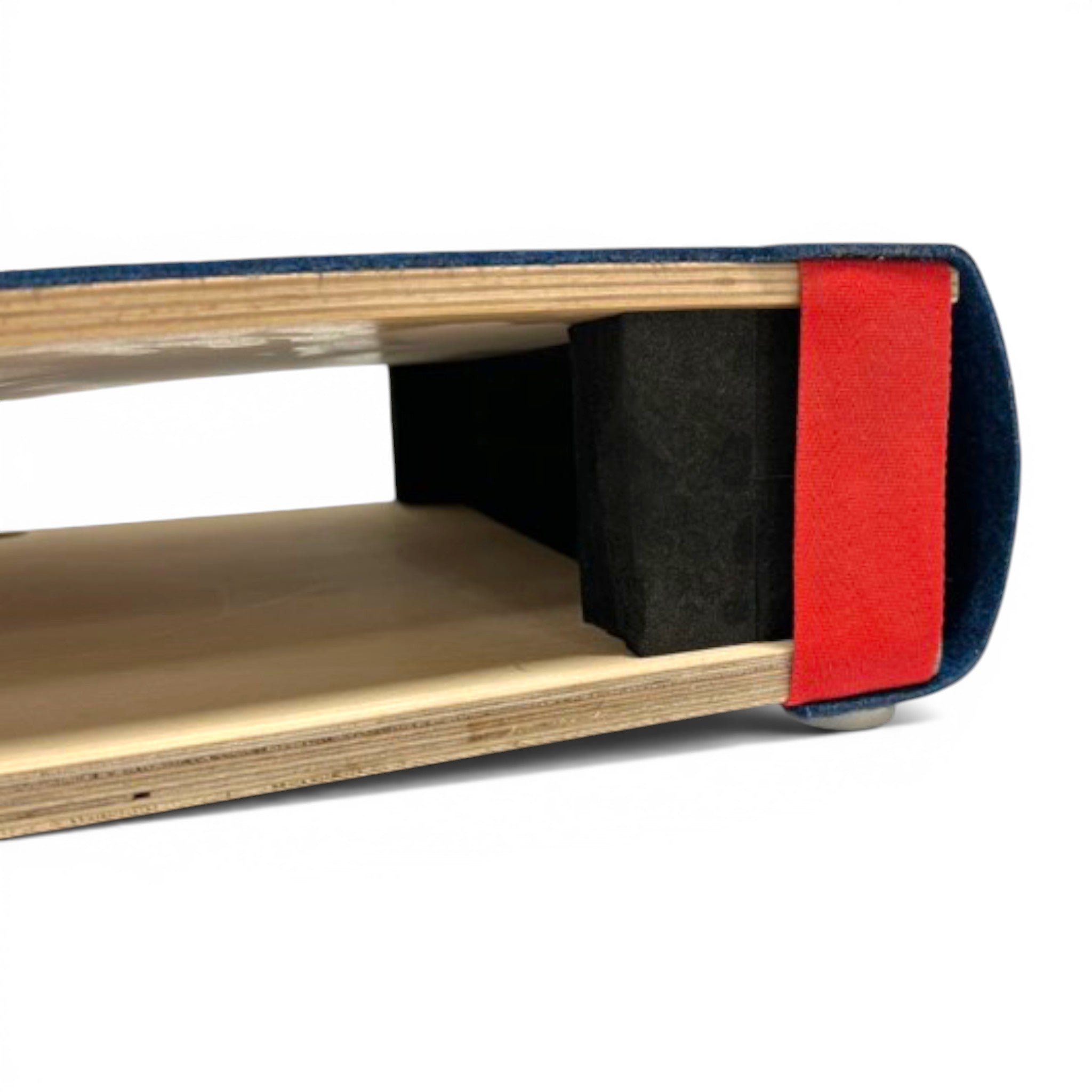 UK Gym Pits junior gymnastics springboard side view showing birch ply construction, blue carpet, and red strap.
