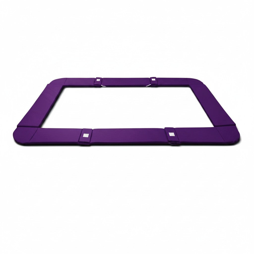 UK Gym Pits purple foam and PVC coverall frame pads for junior trampolines with secure velcro attachment straps.