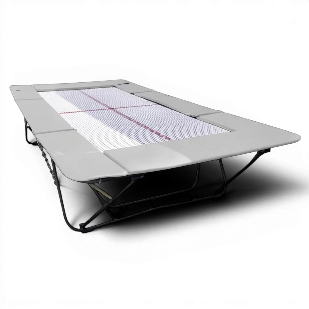 UK Gym Pits junior trampoline with grey frame pads and a white web bed on a black background