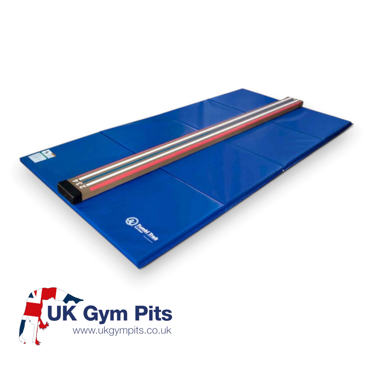 UK Gym Pits laser balance beam with marked lines and numbers placed on a blue folding tumbling mat for gymnastics.