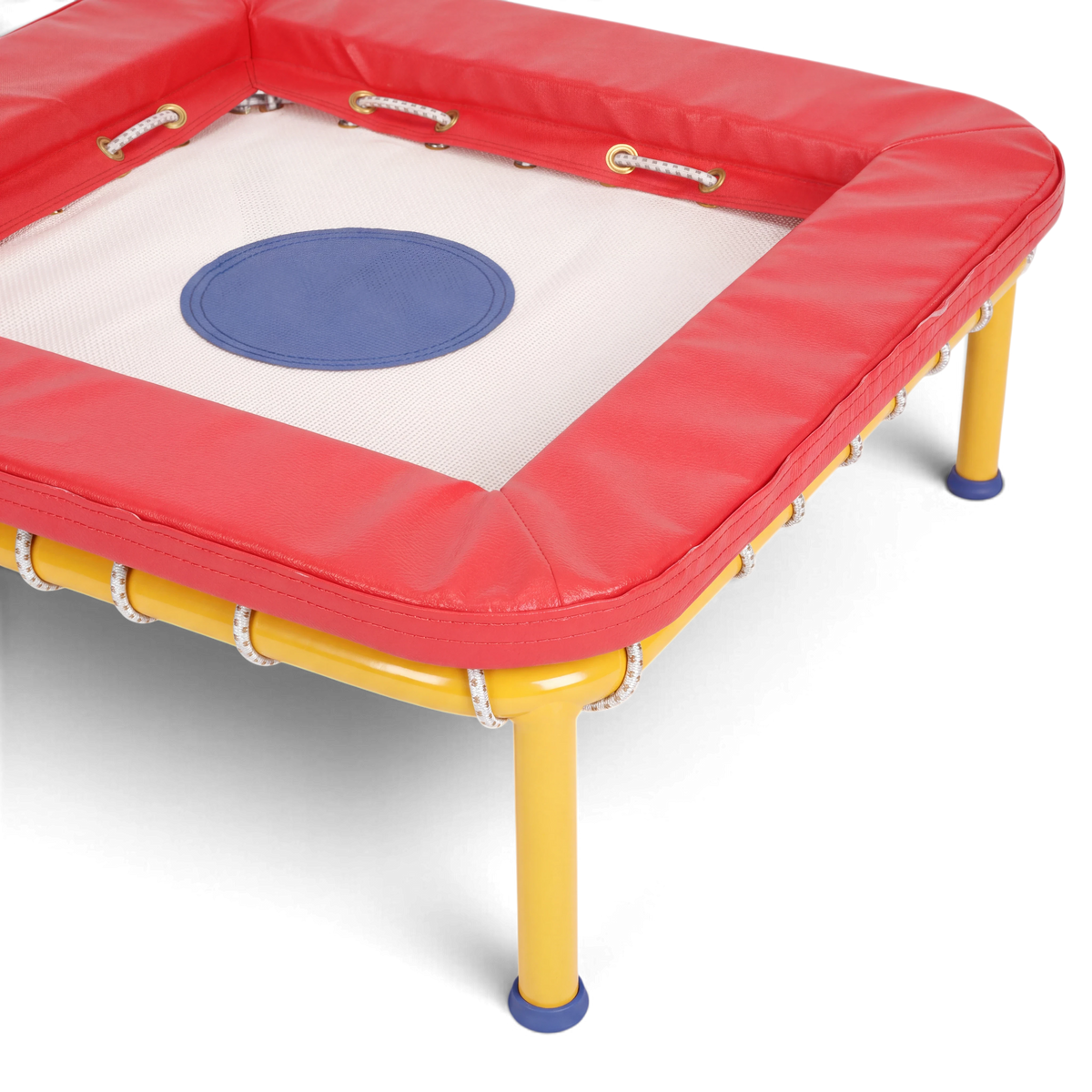 UK Gym Pits Activ Bounce mini trampette with a white bed, red foam padding, and a yellow powder-coated steel frame.