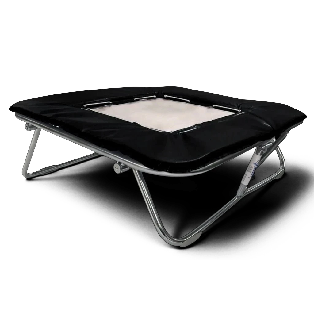 UK Gym Pits super mini trampoline with a solid white super-mesh bed and black protective frame padding.