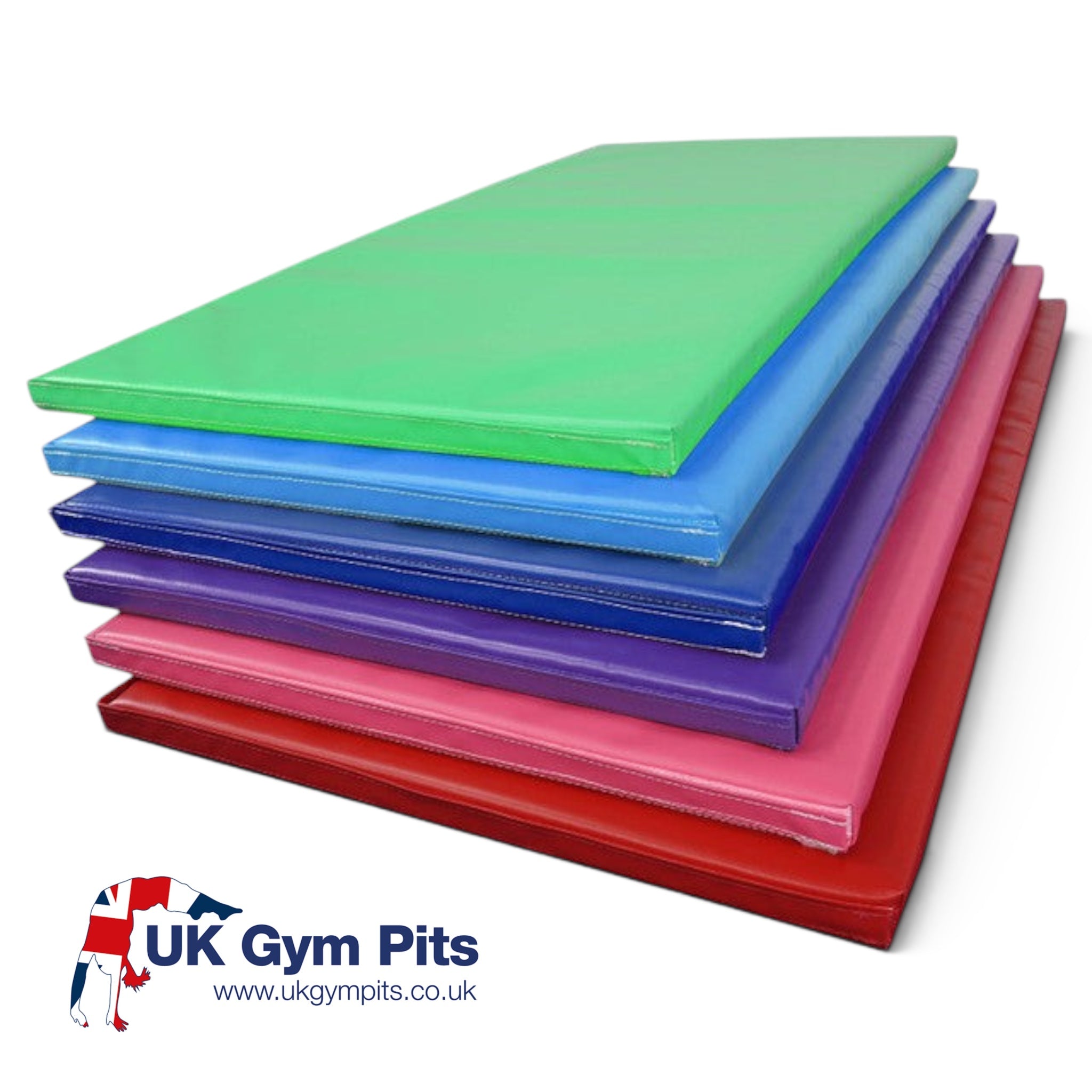 UK Gym Pits modular gymnastics mats in a stack of vibrant vinyl colours including green, blue, purple, pink, and red.
