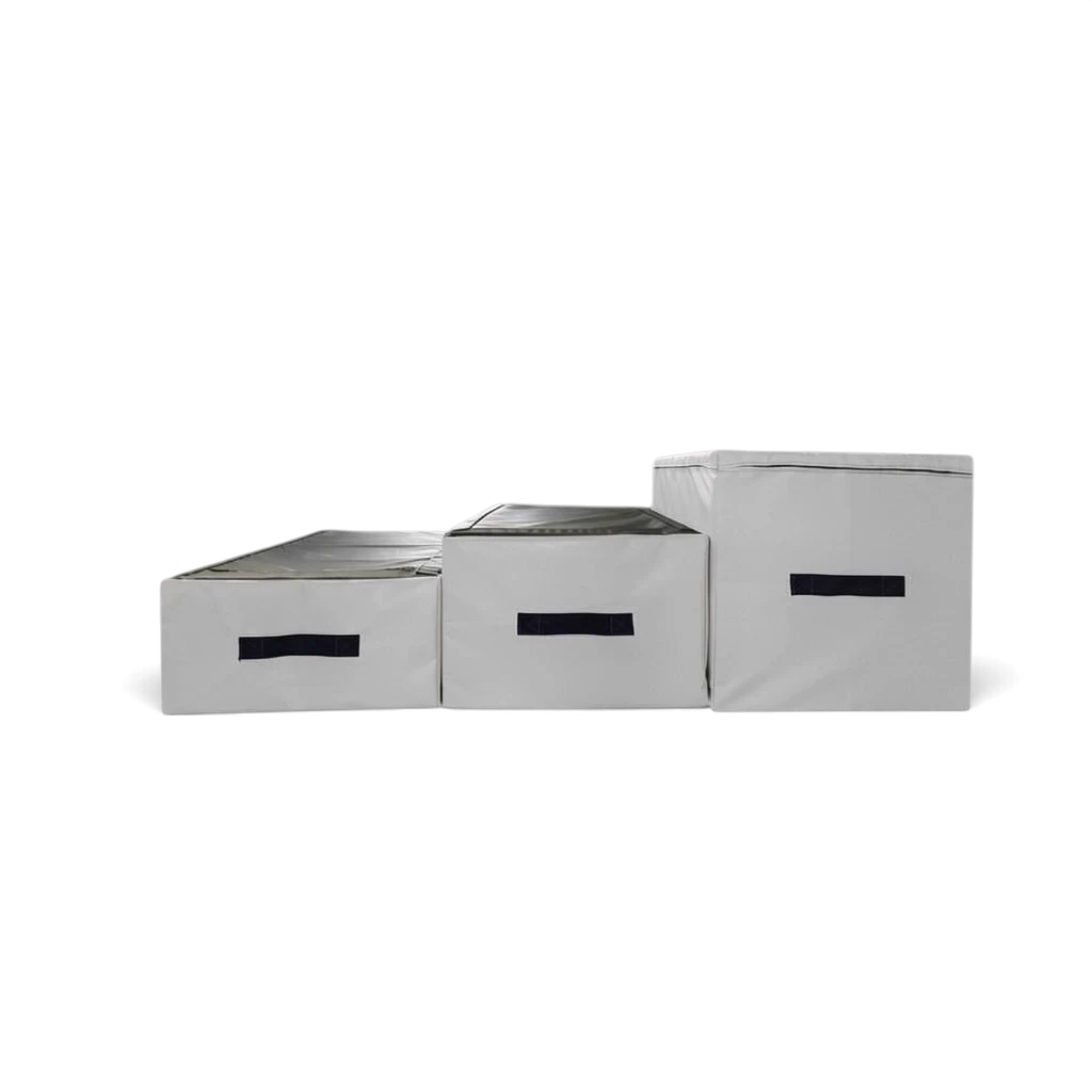 UK Gym Pits parkour jumping blocks in three sizes with white PVC sides, black tops, and convenient carry handles.