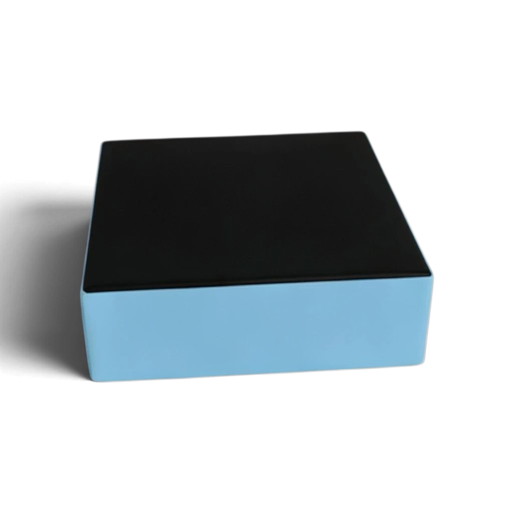 UK Gym Pits parkour stepping block with a black top and light blue sides, made from durable PVC and high-density foam.