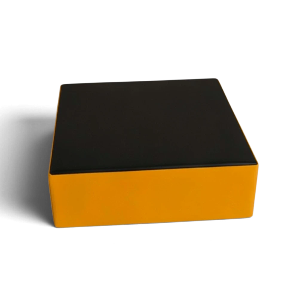 UK Gym Pits parkour stepping block with a black top and yellow sides, made of high-density foam and durable PVC.
