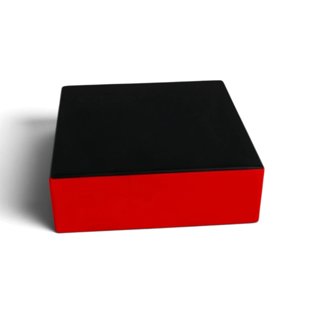 UK Gym Pits parkour stepping block with a black top and red sides made from durable flame-retardant PVC and foam.