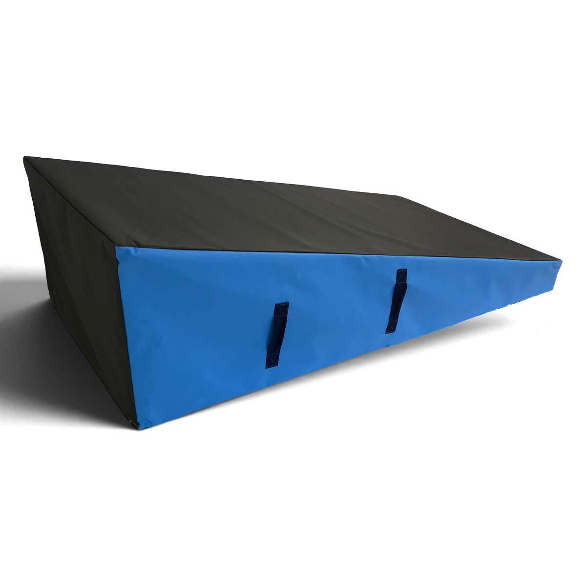 UK Gym Pits parkour wedge block with black top and blue sides, featuring high-density foam and carry handles.